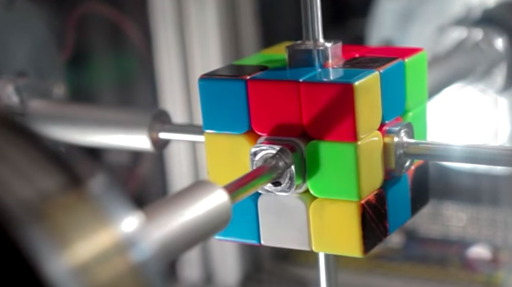 Just a Blink and you will see the Rubik's Cube is solved by this machine