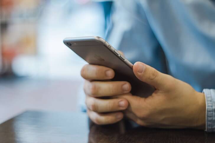 a person holding a phone