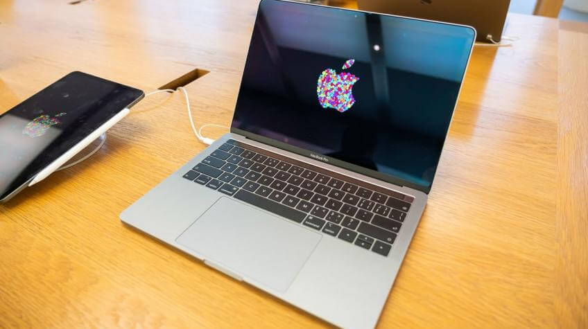 apple macbook pro on the table