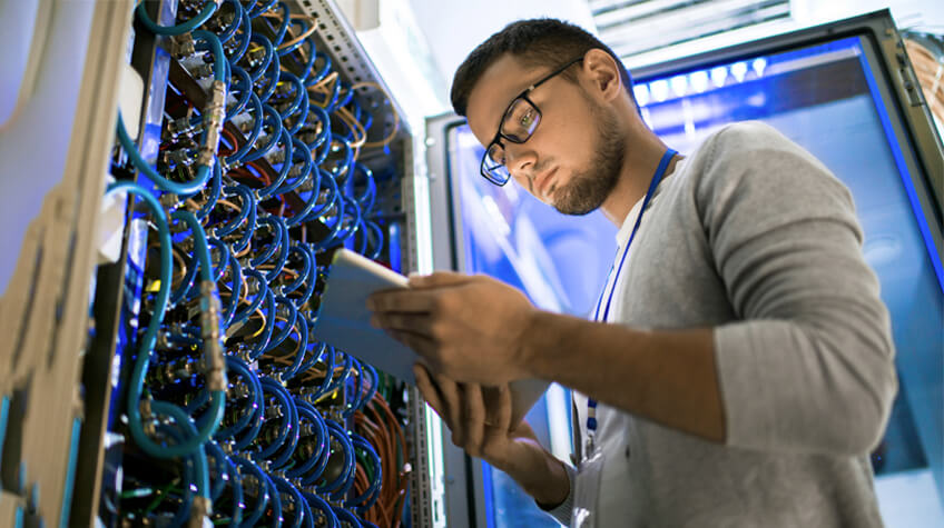 Man Working on Supercomputer Server Side