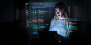 programming-background-with-girl-working-with-codes-laptop