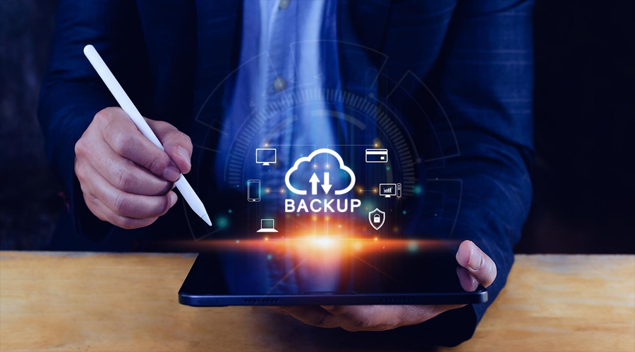 Easy backup and disaster recovery - WeeTech Solution Pvt Ltd Person performing easy backup and disaster recovery