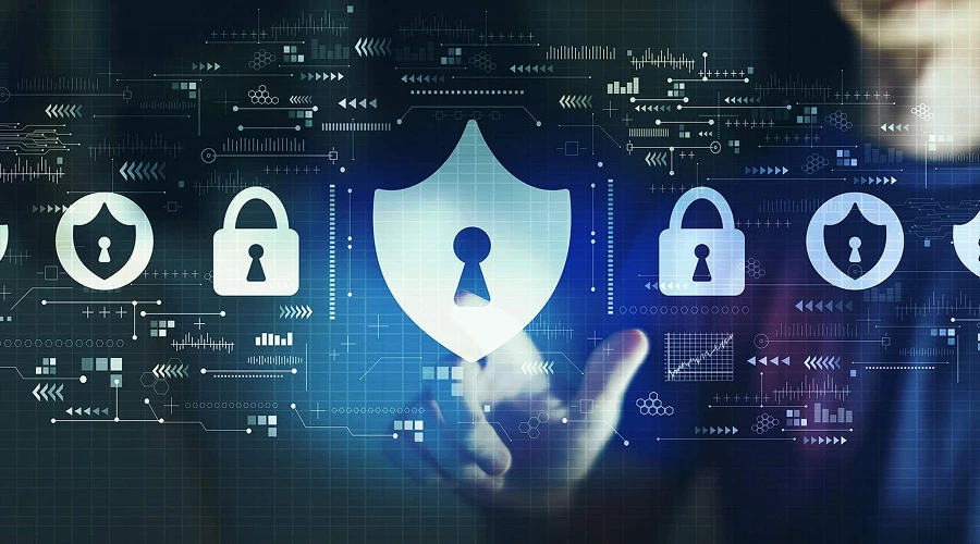 A hand reaches toward a large, glowing digital shield icon centered among various padlock icons and data visualizations, representing cybersecurity and system reliability in a high-tech environment.