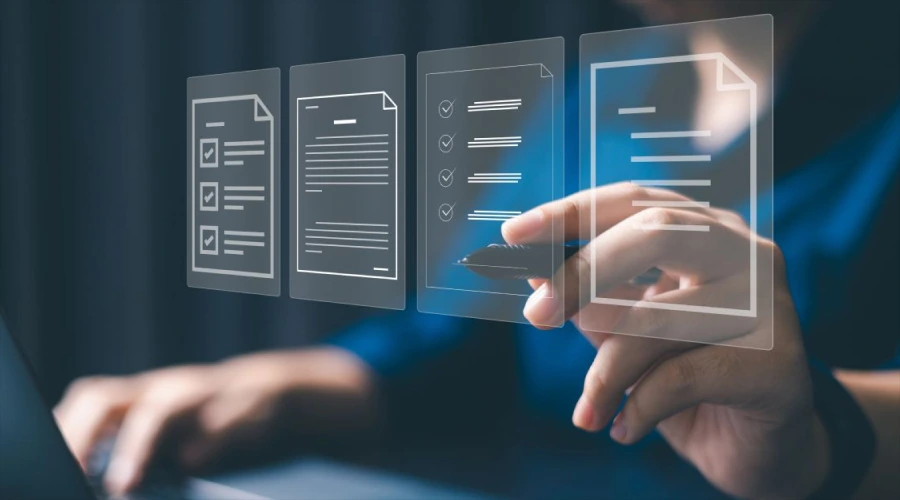 Requirements Management - WeeTech Solution Pvt Ltd A close-up of a person using a stylus to interact with glowing, translucent digital checklists and document templates floating above a laptop.