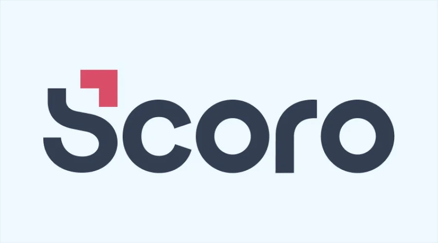 Scoro - WeeTech Solution Pvt Ltd The Scoro logo, consisting of a dark gray wordmark where the letter "S" is stylized with a red upward-pointing arrow at the top corner.