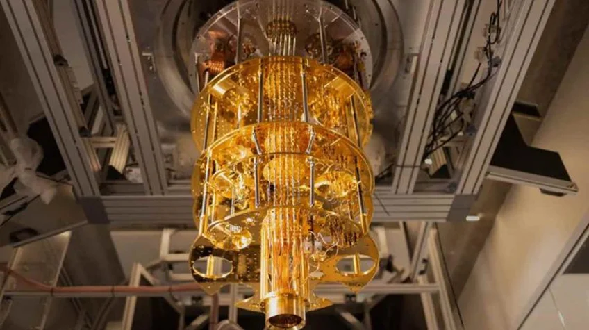 How Quantum Computing Will Transform Industries - WeeTech Solution Pvt Ltd A close-up view of a golden quantum computer chandelier hardware suspended inside a laboratory.