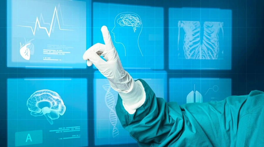 Gloved hand reaching toward a digital medical interface displaying brain, heart, and lung scan visuals.
